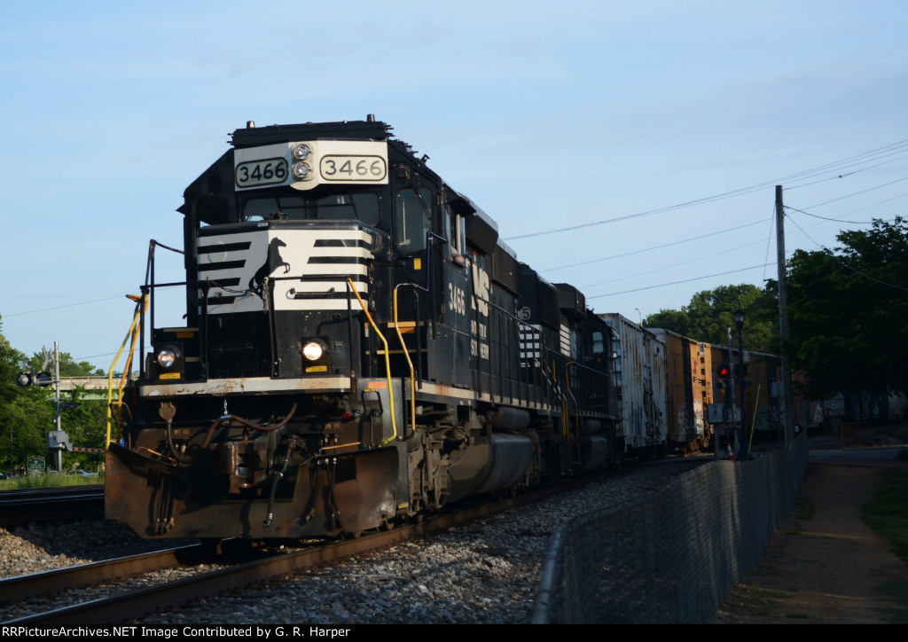 NS yard job E23 crosses Washington Street in downtown Lynchburg with cars for CSX interchange in tow.